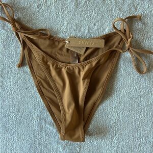 Skims signature swim dipped tie bikini bottom in almond
